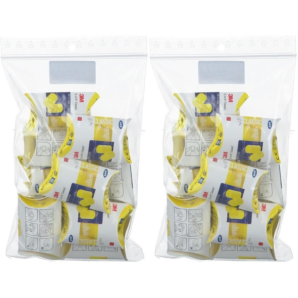 Deux sacs transparents contenant des bouchons d'oreille jaunes. Chaque sac contient plusieurs paquets de bouchons d'oreille jaunes.