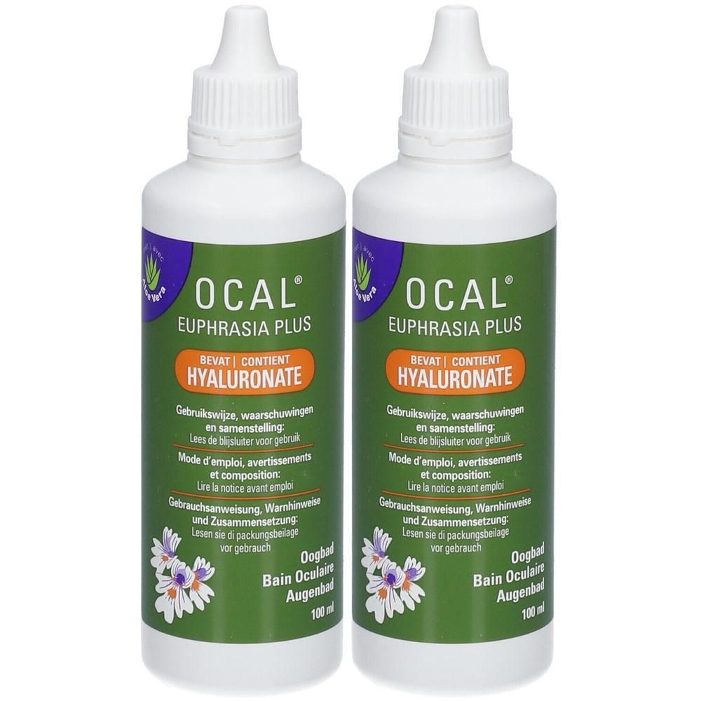 Deux flacons Ocal Euphrasia Plus. Flacons blancs avec étiquettes vertes et accents violets. Contient de l'hyaluronate.