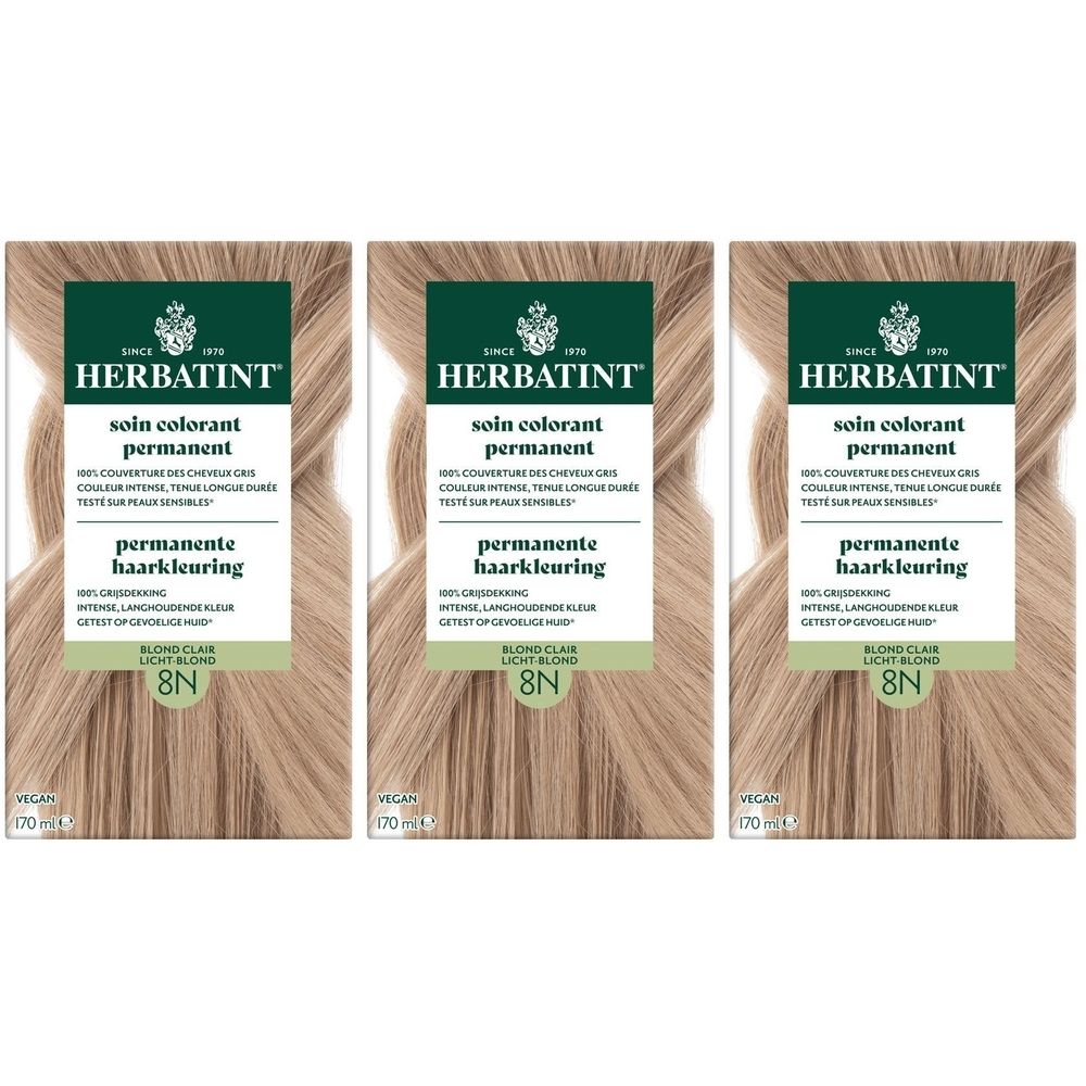 Trois boîtes de Herbatint Soin Colorant Permanent 8N Blond Clair. Emballages avec informations et exemple de couleur.