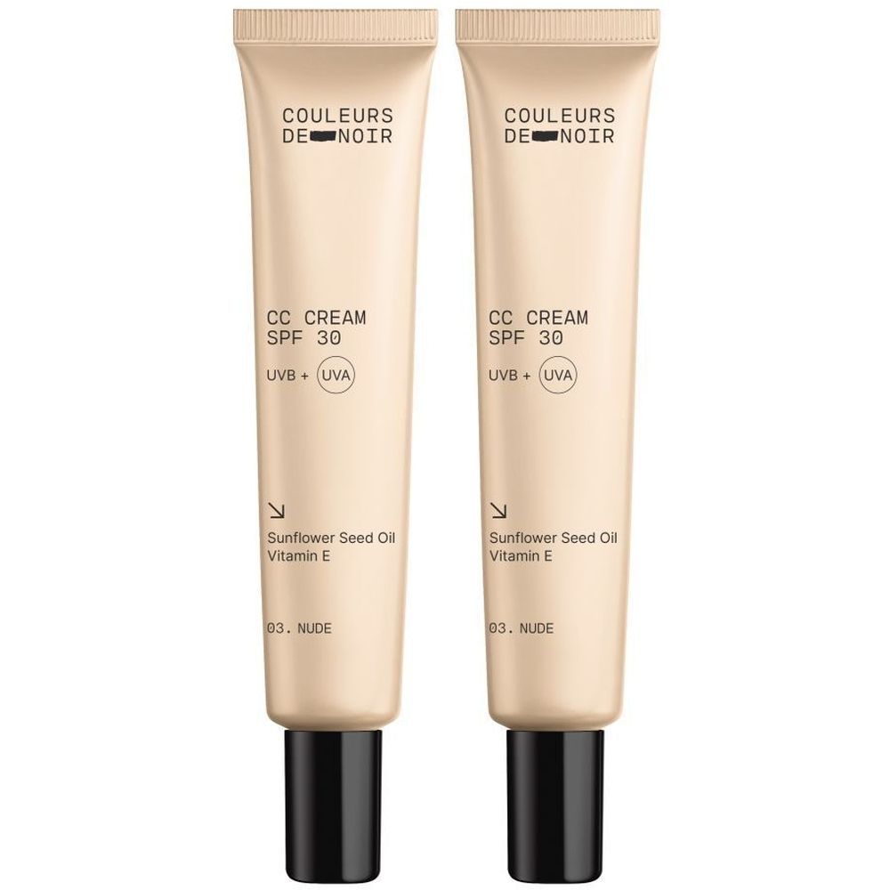 Deux tubes de Couleurs de Noir CC CREAM SPF 30. Tubes beiges avec bouchons noirs. Texte: CC CREAM, SPF 30, 03 Nude.