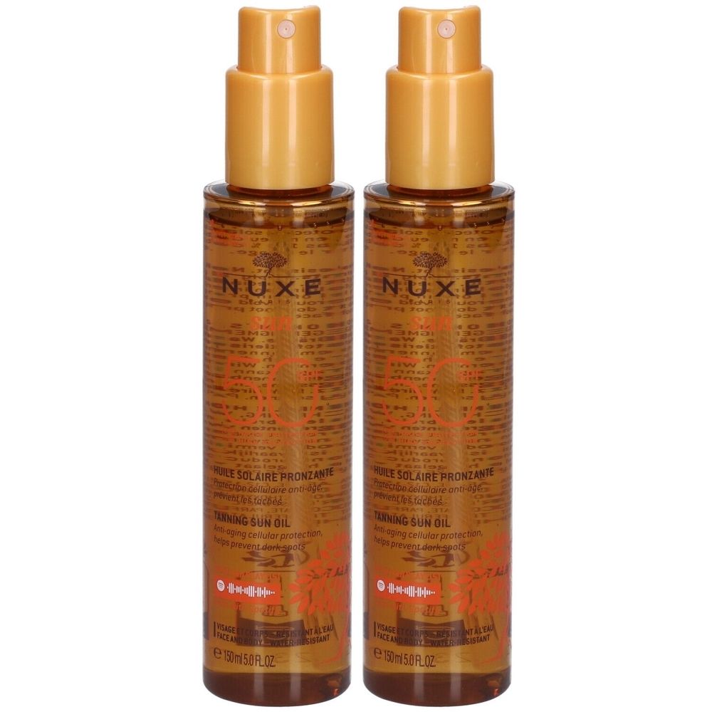 Deux flacons de NUXE Huile solaire visage & corps SPF 50. Liquide doré, vaporisateur doré, étiquette avec texte.