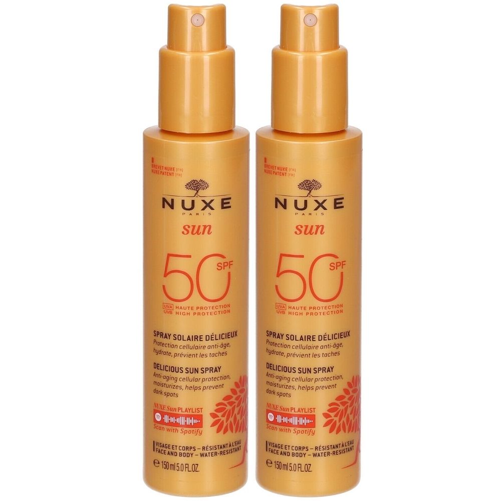 Deux flacons de spray NUXE Sun SPF50. Flacons orange avec vaporisateur. Texte: SPF50, Delicious Sun Spray, NUXE.