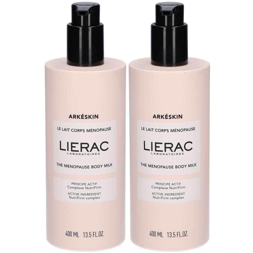 Deux flacons de Lait Corps Ménopause. Flacons roses avec pompe noire. Logo LIERAC et texte sur l'étiquette.