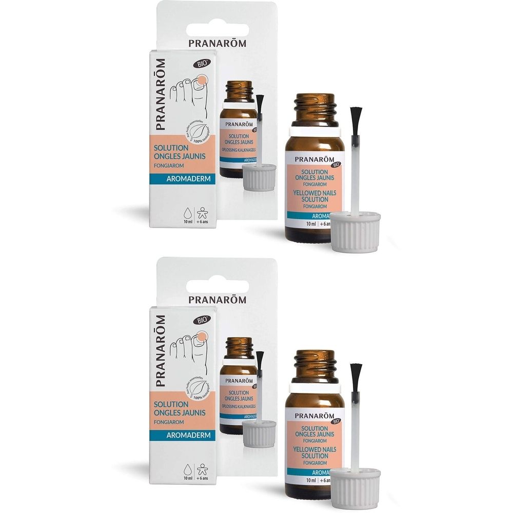 Flacon en verre brun avec pinceau et bouchon blanc. Boîte avec informations produit à côté. Les deux affichent la marque PRANAROM.