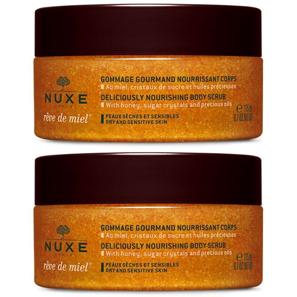 Deux pots de gommage corporel NUXE Rêve de Miel®. Couvercle marron, contenu doré. Texte : « Gommage Gourmand Nourrissant Corps ».