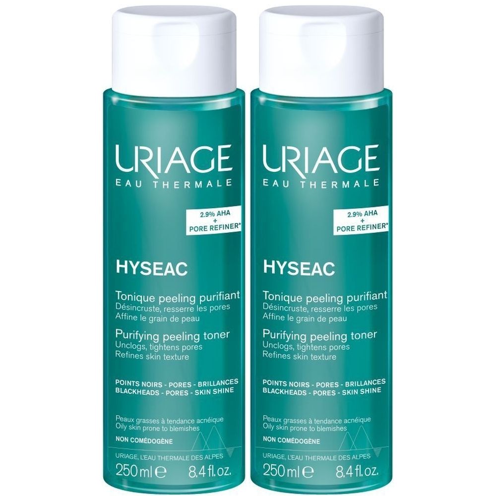 Deux flacons de Uriage Hyseac Tonique Peeling Purifiant. Liquide turquoise, bouchon blanc. Texte: 2.9% AHA + Pore Refiner.