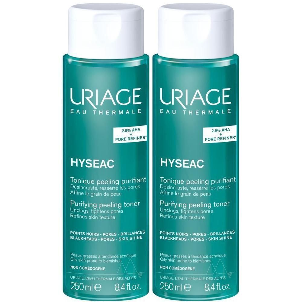 Deux flacons de Uriage Hyseac Tonique Peeling Purifiant. Liquide turquoise, bouchon blanc. Texte: 2.9% AHA + Pore Refiner.