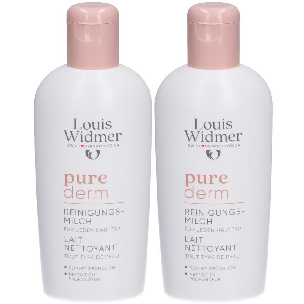 Deux flacons de Lait Nettoyant Louis Widmer Purederm. Flacons blancs avec bouchons roses. Inscription : pure derm, Lait Nettoyant, tout type de peau.