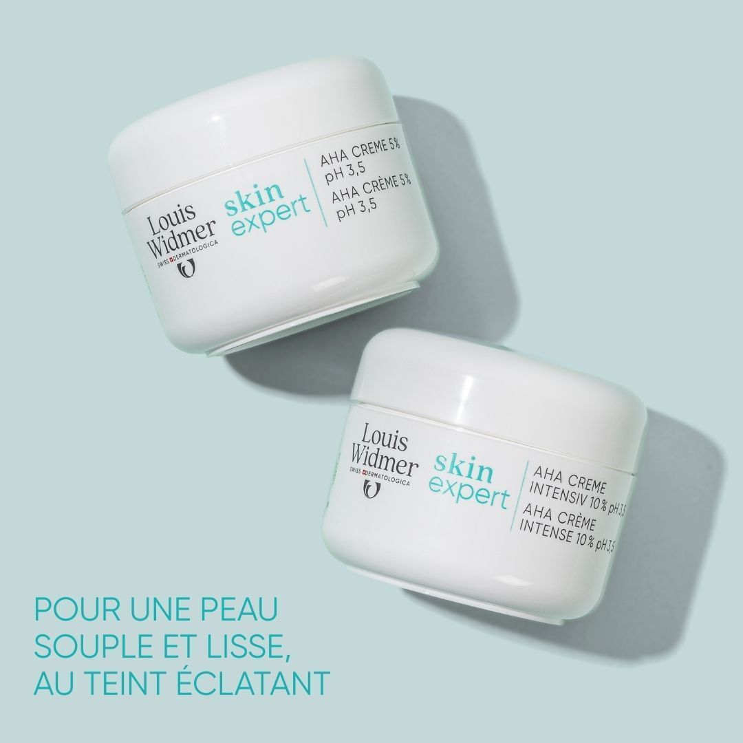 Pot ouvert avec crème. Inscription : Louis Widmer skin expert AHA Crème Intensif 10% pH 3,5. Texte : Stimule le renouvellement cellulaire.