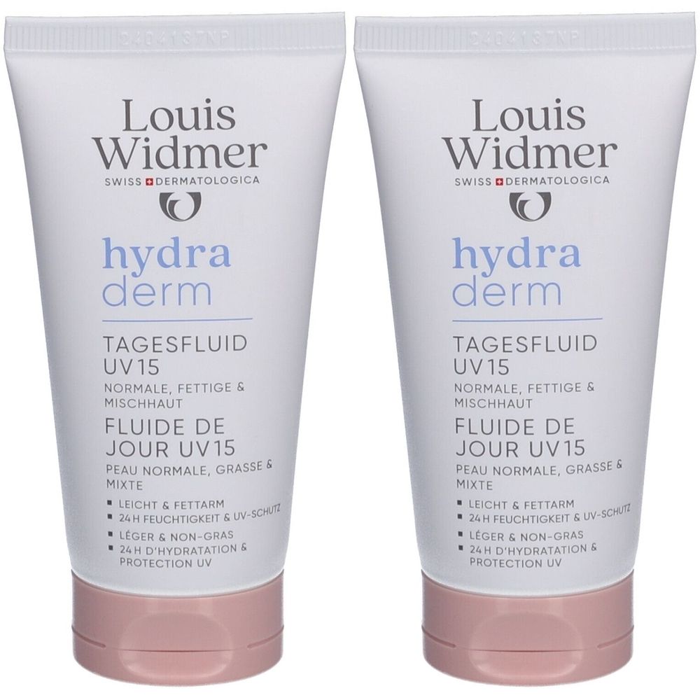 Deux tubes de Louis Widmer Hydraderm Fluide de Jour UV15. Blanc, bouchon rose. Inscription : hydra derm, UV15, 24h d'hydratation.