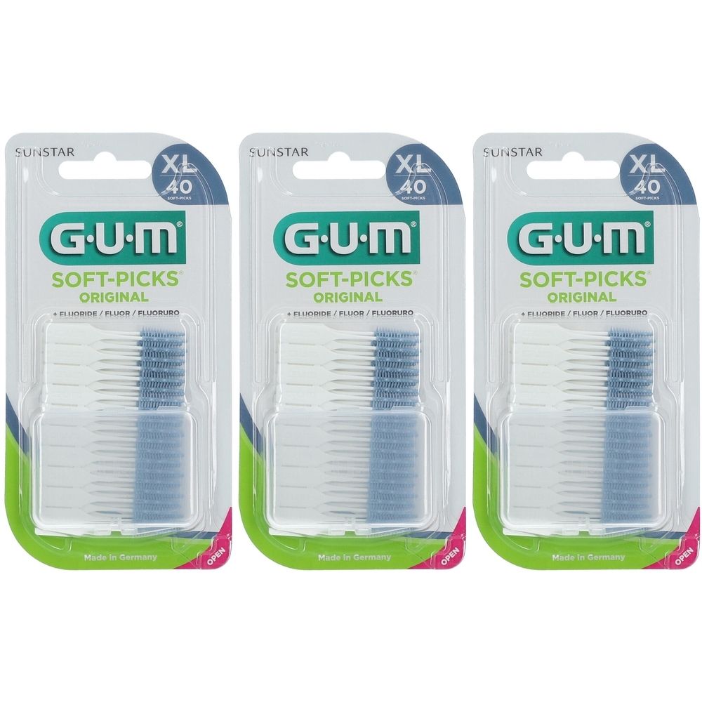 Trois paquets de GUM Soft-Picks Original. Chaque paquet contient 40 brossettes XL. Emballage vert et blanc avec nom du produit.