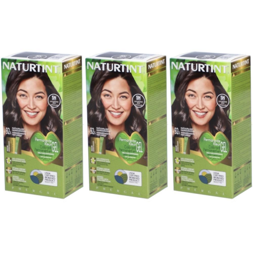 Trois boîtes NATURTINT® Coloration Permanente 5N. Impression: femme aux cheveux bruns. Emballage vert et marron.