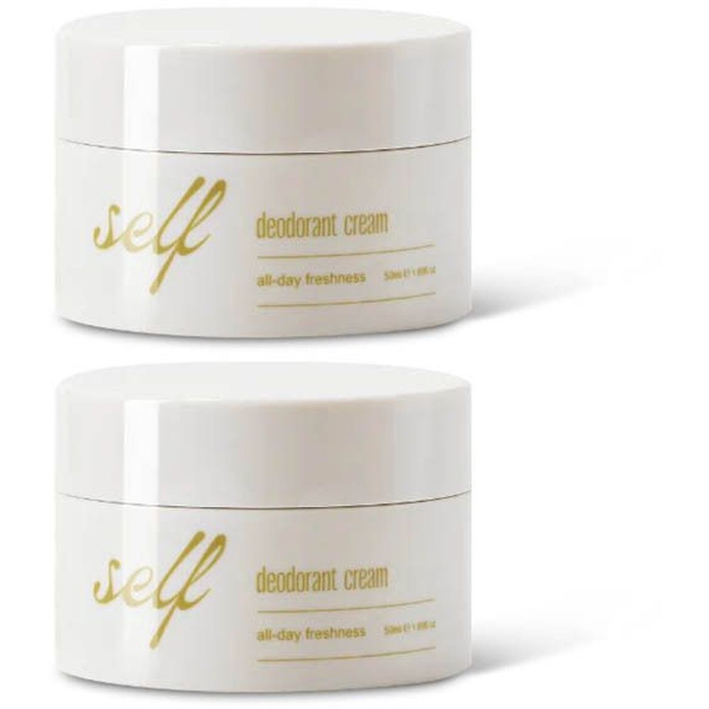 Deux pots crème avec couvercles. Inscription "self deodorant cream all-day freshness". Texte doré.