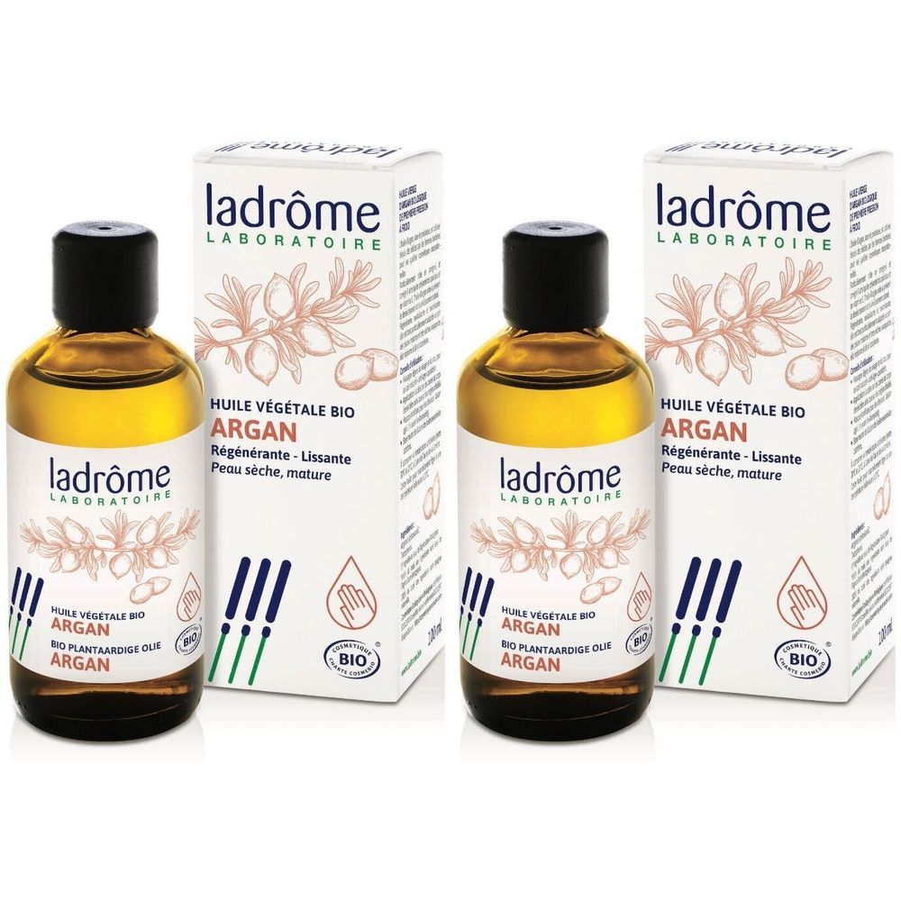 Deux flacons et deux boîtes. Inscription: Huile végétale Bio Argan. Certification Bio.
