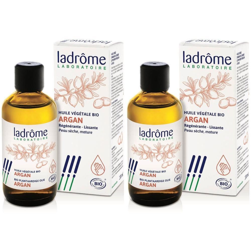Deux flacons et deux boîtes. Inscription: Huile végétale Bio Argan. Certification Bio.