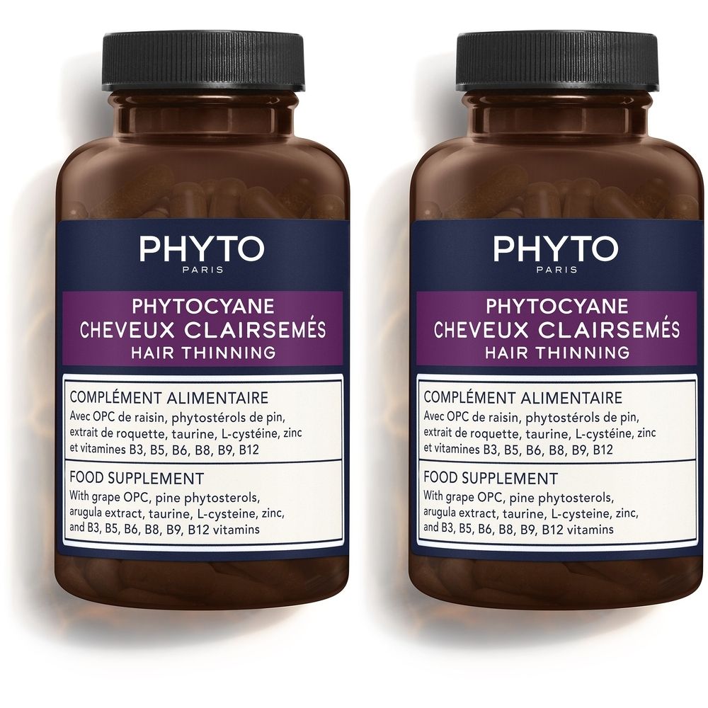 Deux flacons de gélules brunes. Inscription: PHYTOCYANE CHEVEUX CLAIRSEMÉS. Complément alimentaire.