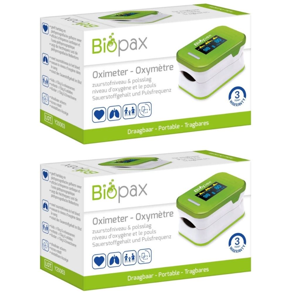 Deux boîtes de Biopax Oxymètre. Appareil vert et blanc avec écran. Boîte avec nom et symboles.