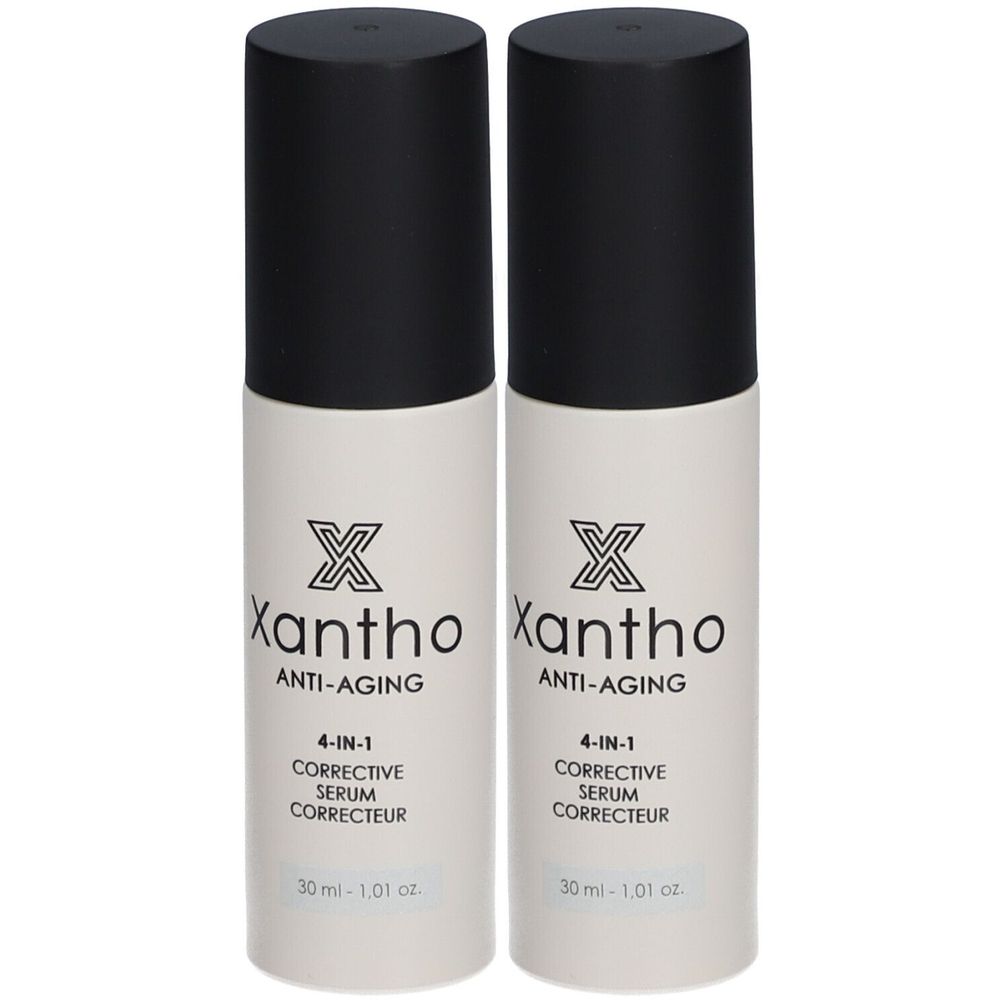 Deux flacons de sérum anti-âge Xantho. Flacons blancs avec bouchon noir. Inscription : Xantho, Anti-Aging, 4-IN-1, Corrective Serum.