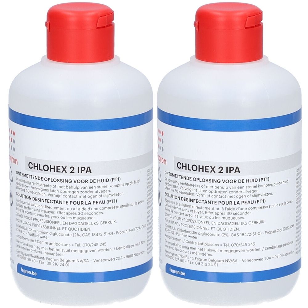 Deux flacons de PHARMAWHITE® CHLOHEX 2 IPA. Flacons blancs avec bouchon rouge. Inscription bleue. Texte: CHLOHEX 2 IPA.