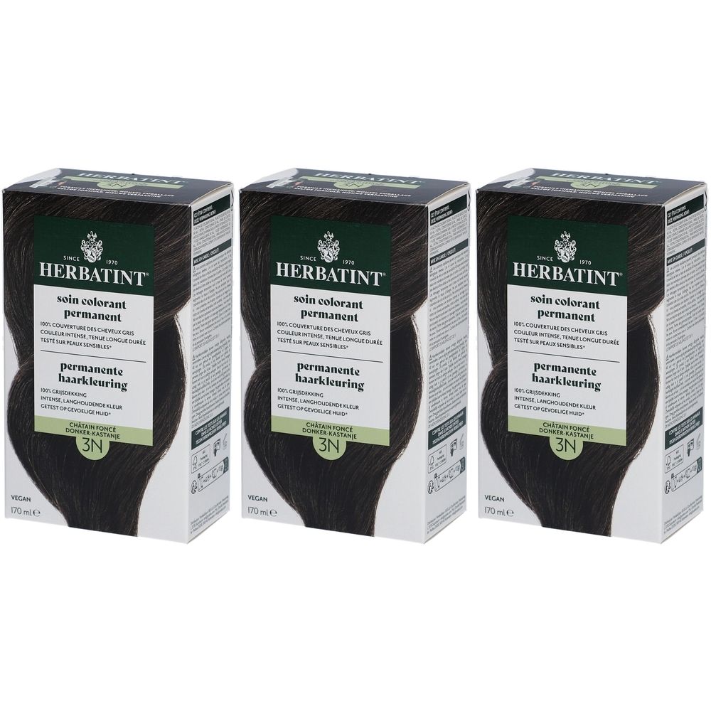 Trois boîtes Herbatint Soin Colorant Permanent 3N. Étiquette verte et blanche, cheveux foncés. Vegan.