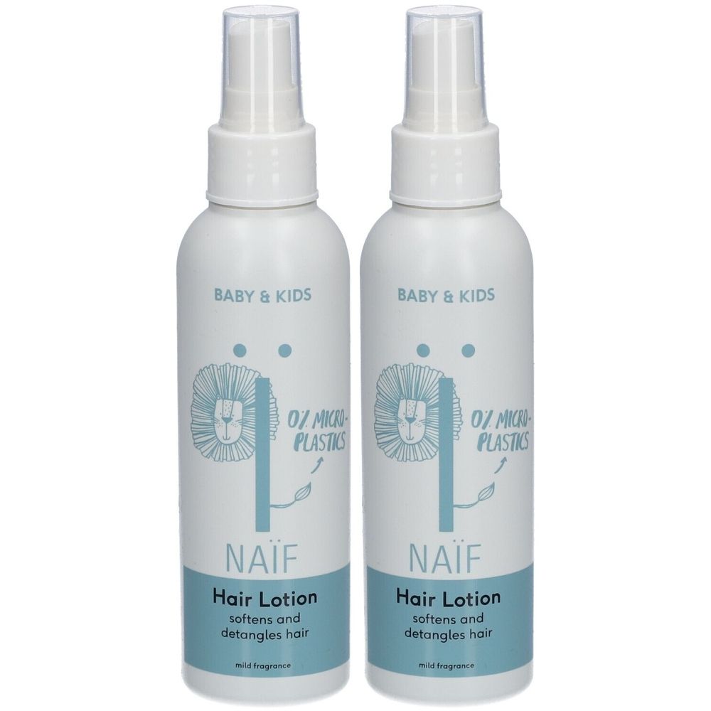 Deux flacons de lotion capillaire Naïf. Flacons blancs avec vaporisateur. Inscription: Baby & Kids, lion, 0% microplastiques, Hair Lotion, mild fragrance.