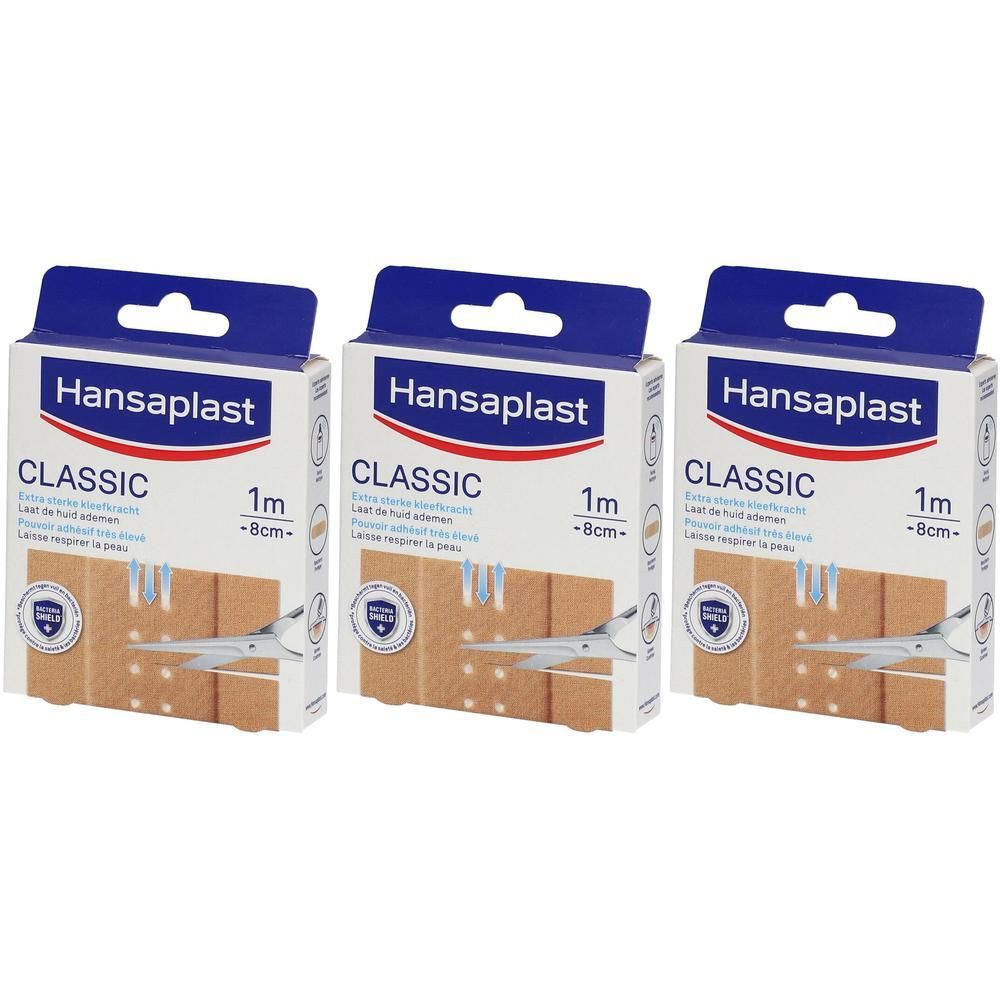Trois boîtes de Hansaplast Classic Pansement. Chaque boîte montre des bandes de pansements, 1m x 8cm. Emballage bleu et blanc.