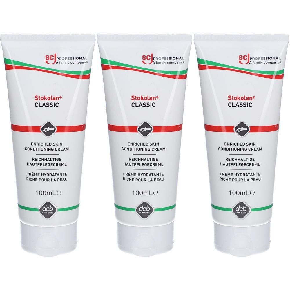 Trois tubes de crème Stokolan® Classic. Tubes blancs avec lettrage rouge et vert. Texte : "ENRICHED SKIN CONDITIONING CREAM".
