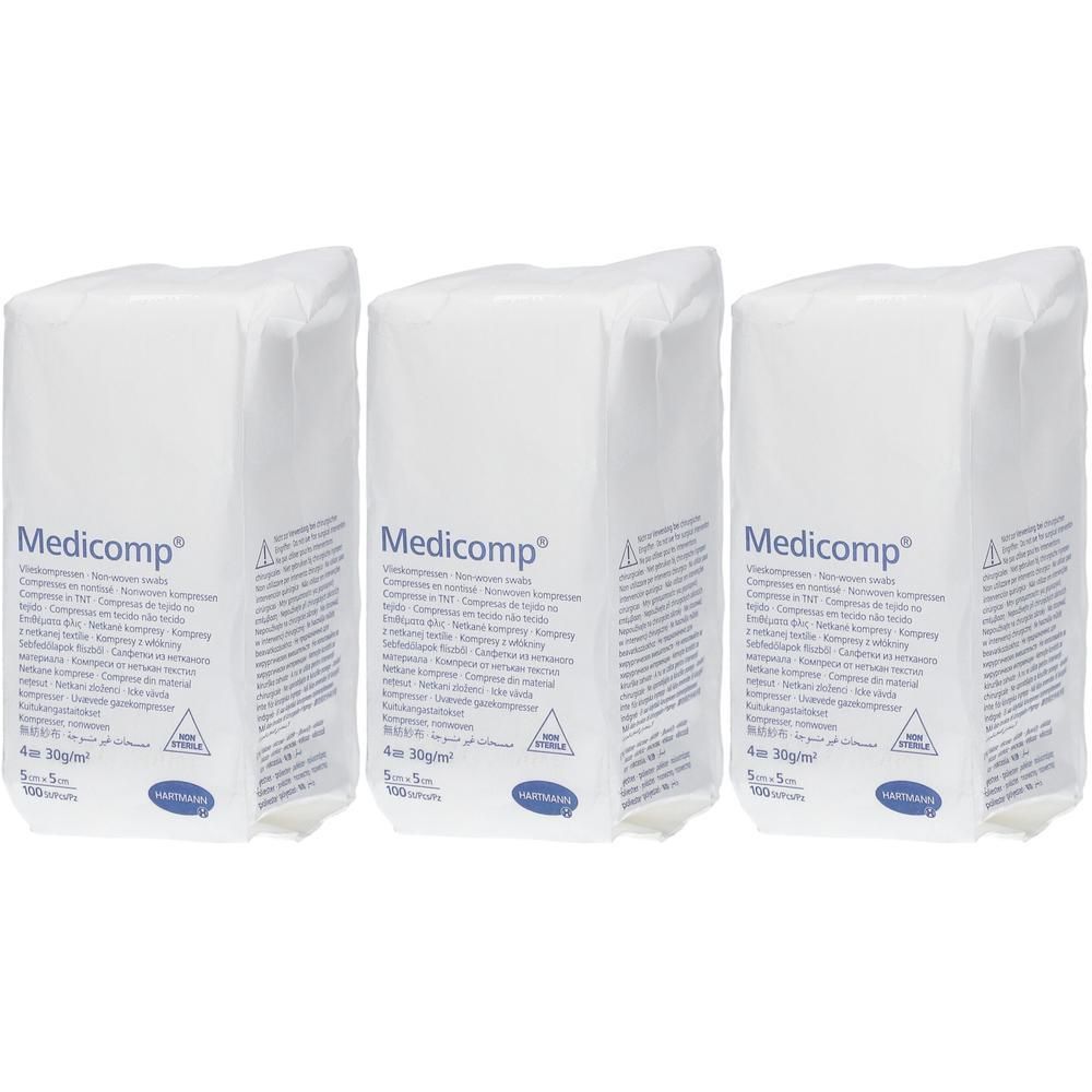 Trois emballages blancs avec l'inscription "Medicomp". Chaque emballage présente des informations et un logo.