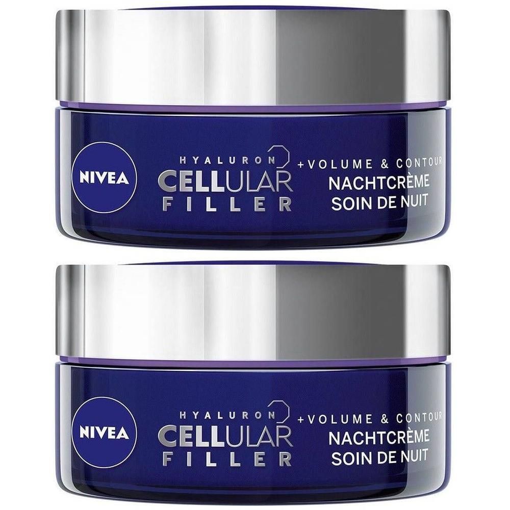 Deux pots de crème de nuit NIVEA Cellular Filler. Pots bleus avec couvercles argentés. Texte : Hyaluron + Volume & Contour, Nachtcreme, Soin de Nuit.