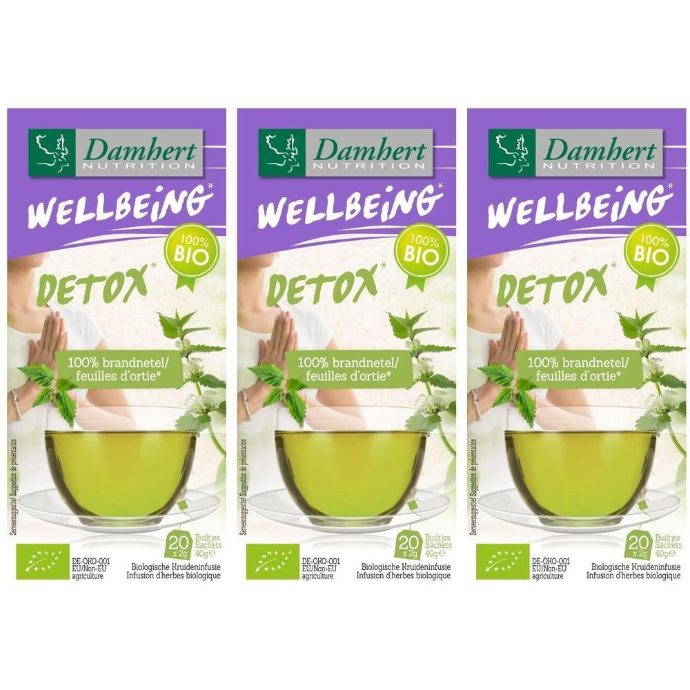 Trois boîtes de thé Damhert Wellbeing Detox. Chaque boîte montre une tasse de thé aux feuilles d'ortie et le label bio.