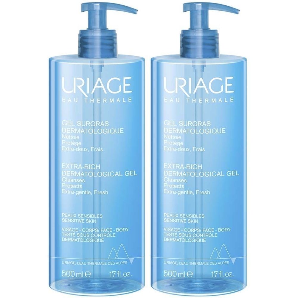 Deux flacons bleus avec pompe. Inscription: Uriage Eau Thermale, Gel Surgras Dermatologique, 500 ml.