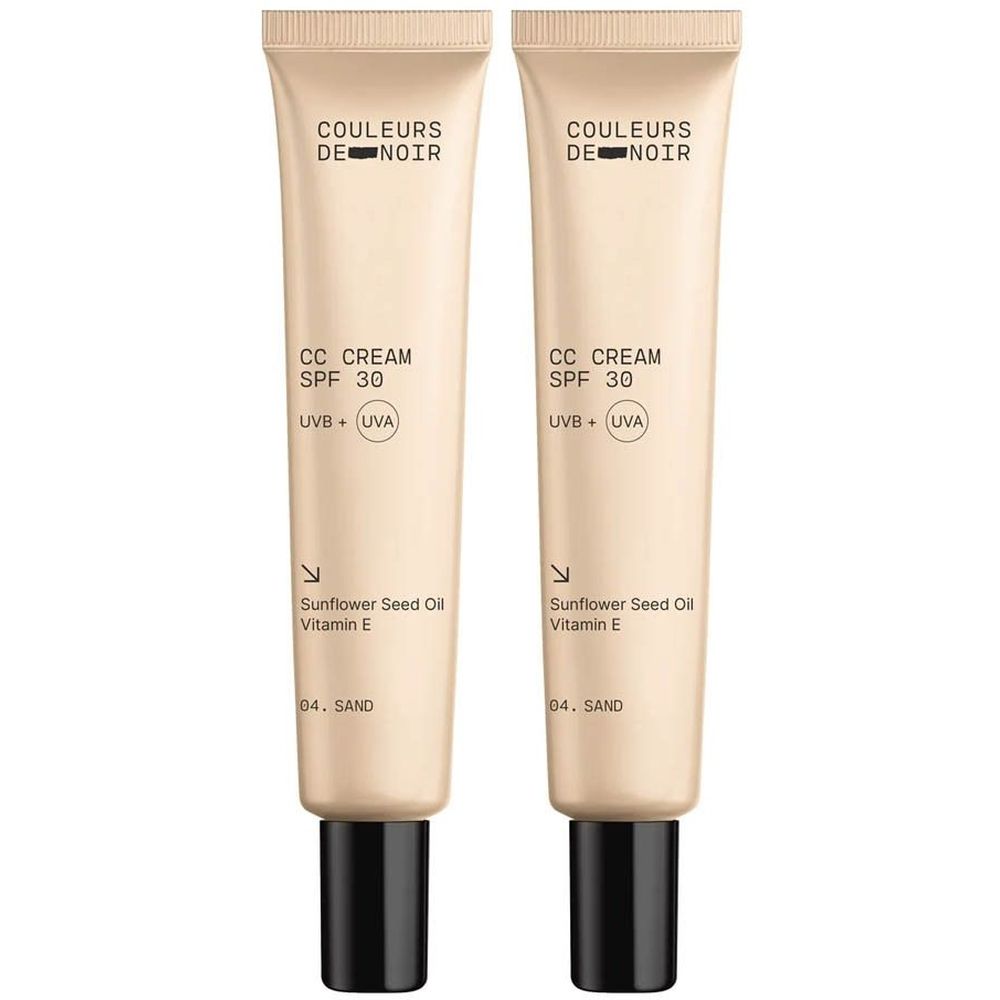 Deux tubes de Couleurs de Noir CC Crème SPF30 04. Sand. Tubes beiges avec bouchons noirs. Texte: CC CREAM, SPF 30, UVB + UVA.