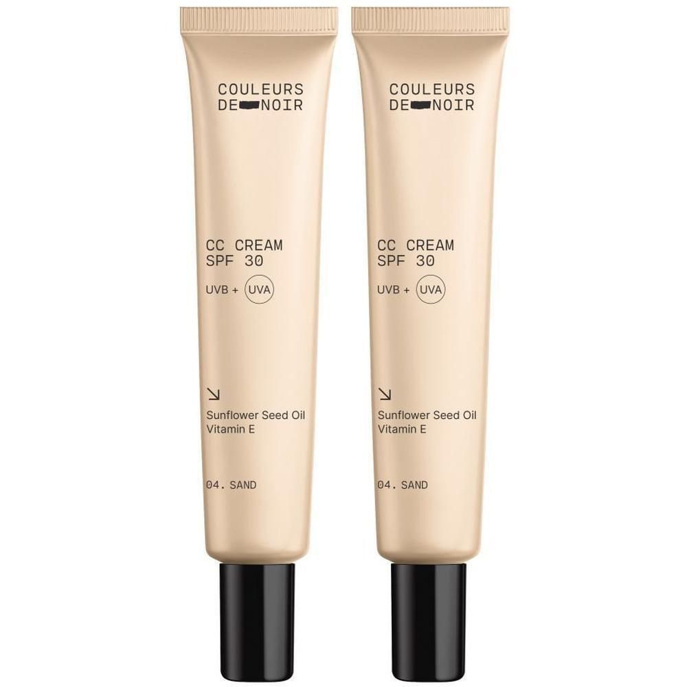 Deux tubes de Couleurs de Noir CC Crème SPF30 04. Sand. Tubes beiges avec bouchons noirs. Texte: CC CREAM, SPF 30, UVB + UVA.
