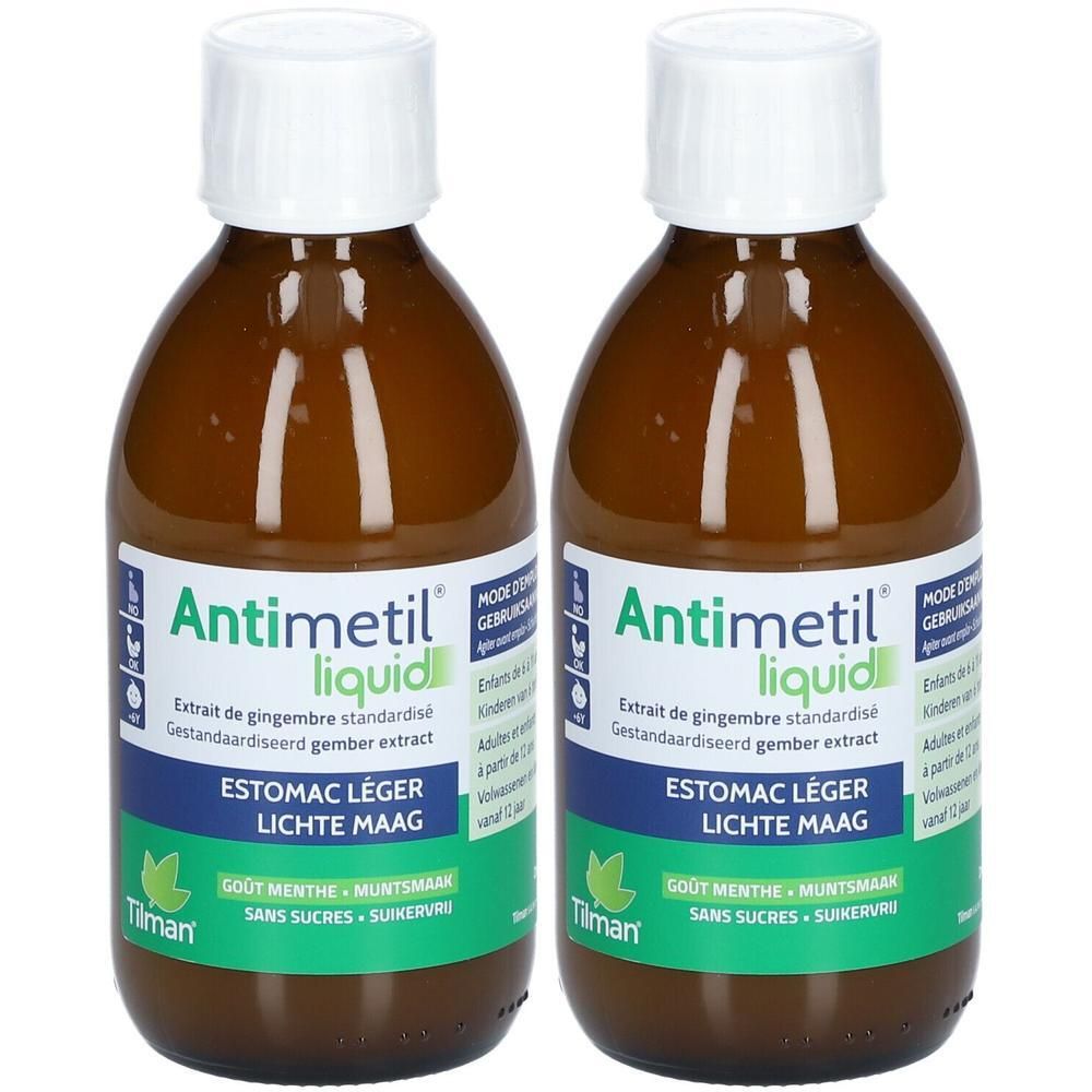Deux flacons bruns avec bouchon blanc. Étiquette avec bande verte et nom du produit. Texte: ESTOMAC LÉGER, LIQUID.