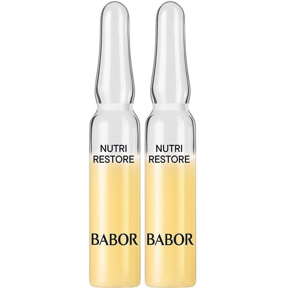 Deux ampoules en verre avec liquide jaune. Inscription : Nutri Restore, Babor.