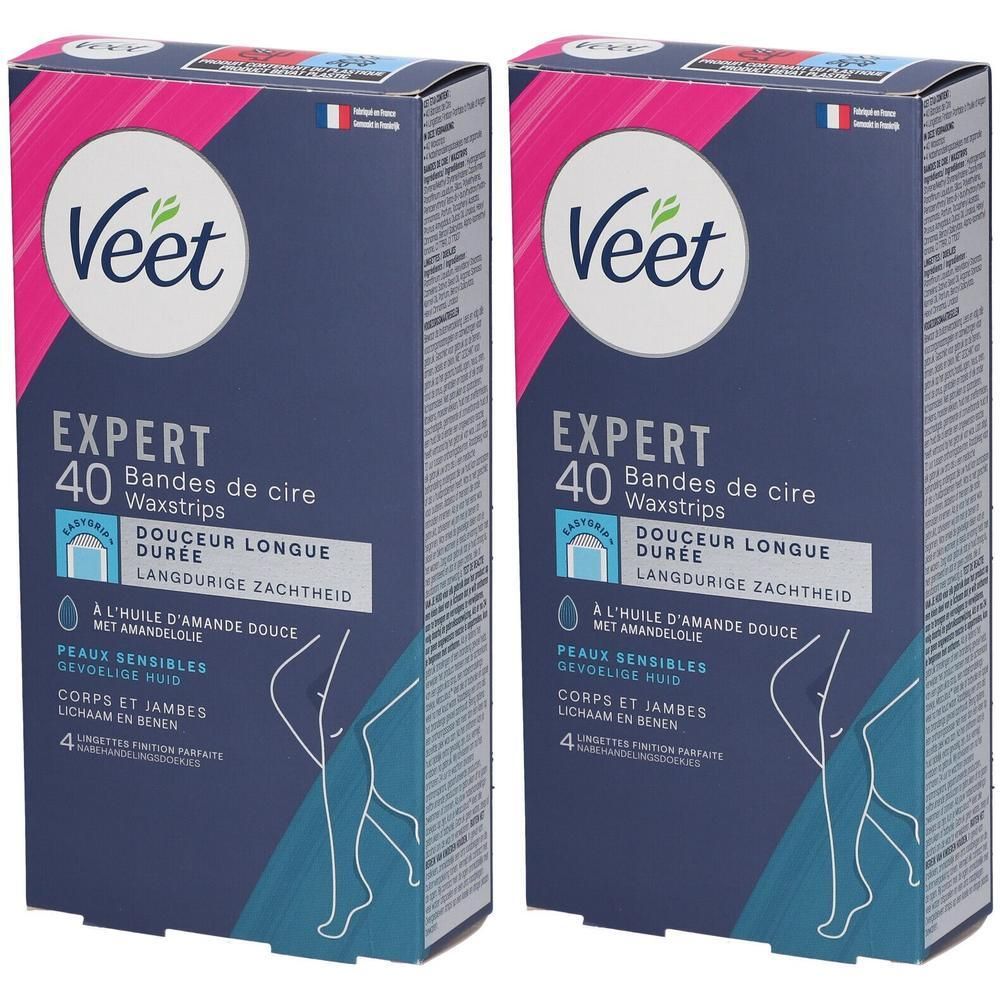 Deux boîtes de bandes de cire Veet Expert. Emballage bleu et rose avec informations produit et logo Veet.