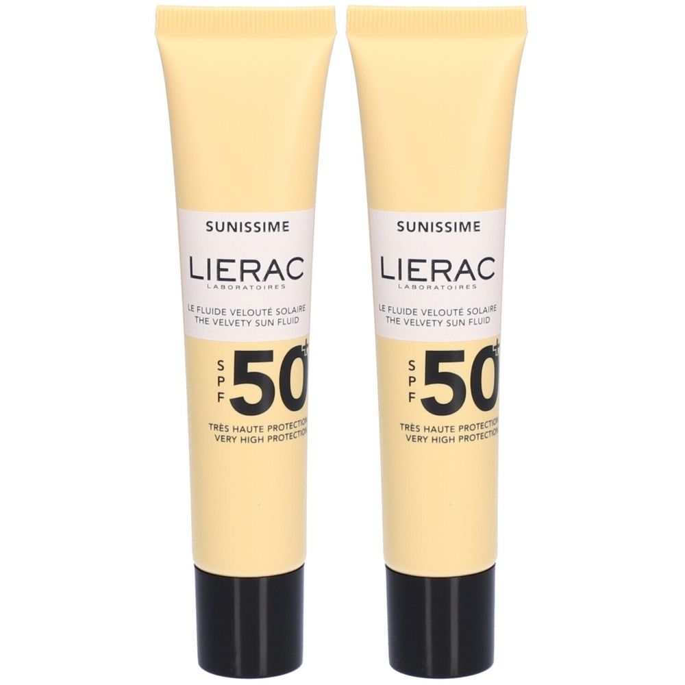 Deux tubes de Lierac Sunissime Le Fluide Velouté Solaire SPF 50+. Tubes beiges, bouchons noirs. Texte: SPF 50, Sunissime, Lierac.
