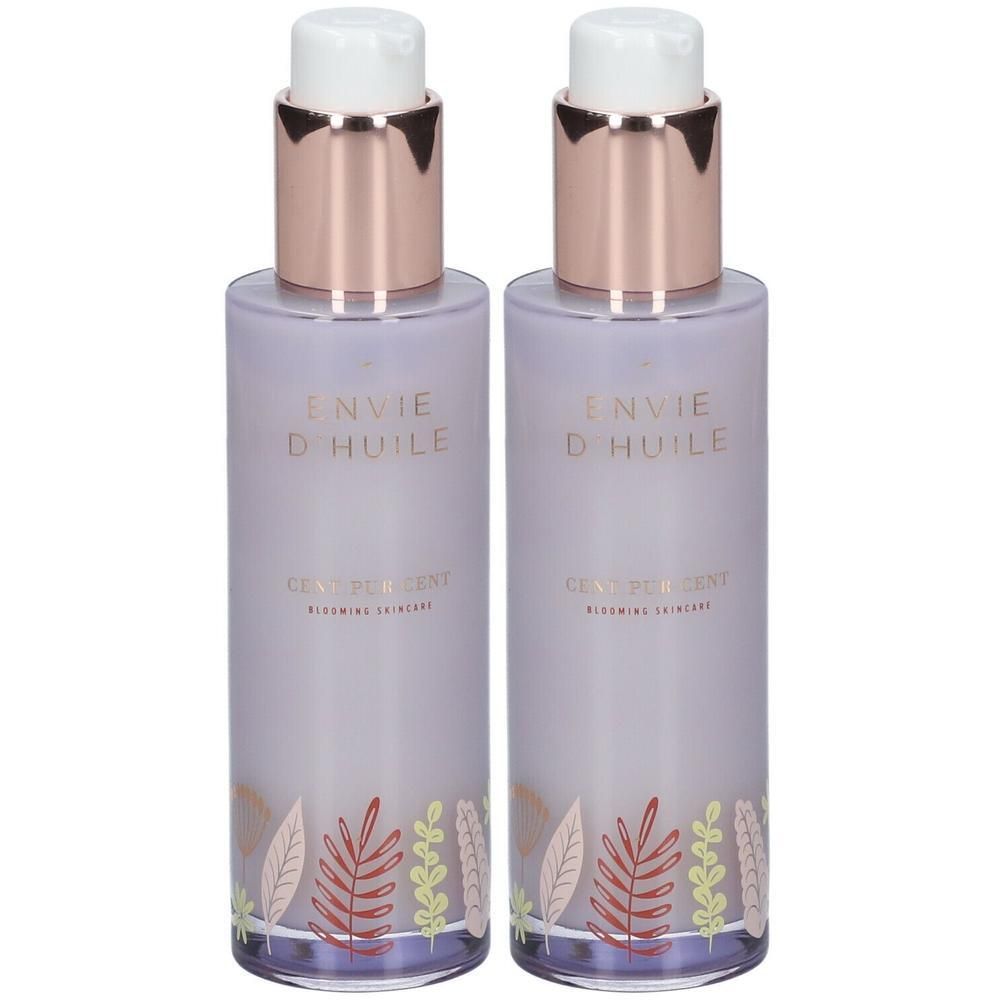 Deux flacons avec pompe. Inscription : Envie d'huile, Cent Pur Cent. Décor floral.