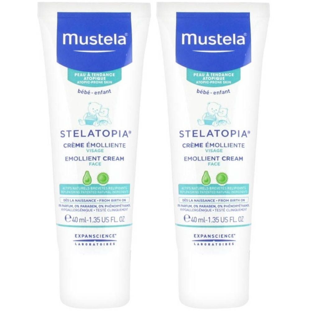 Deux tubes de crème visage Mustela Stelatopia. Blanc, avec texte bleu et vert. Contient 40 ml.
