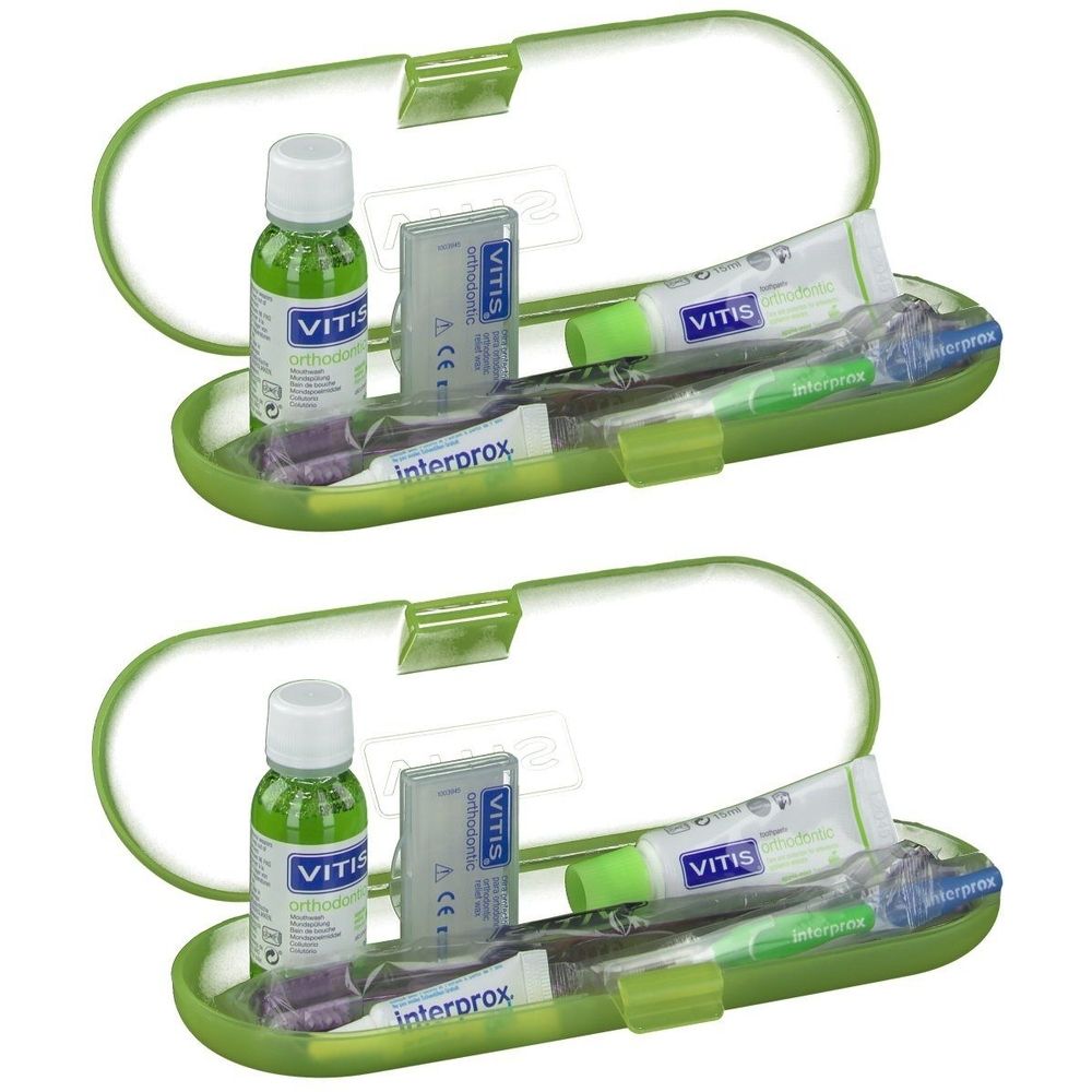 Deux étuis verts avec produits d'hygiène dentaire. Contiennent bain de bouche, dentifrice, brosse à dents et brosse Interprox.
