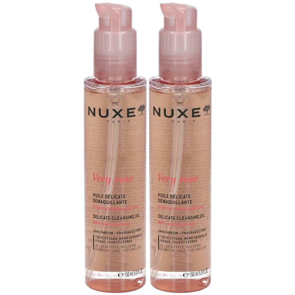 Deux flacons d'huile démaquillante NUXE Very Rose avec bouchon rose. Inscription: Huile Démaquillante, Delicate Cleansing Oil.