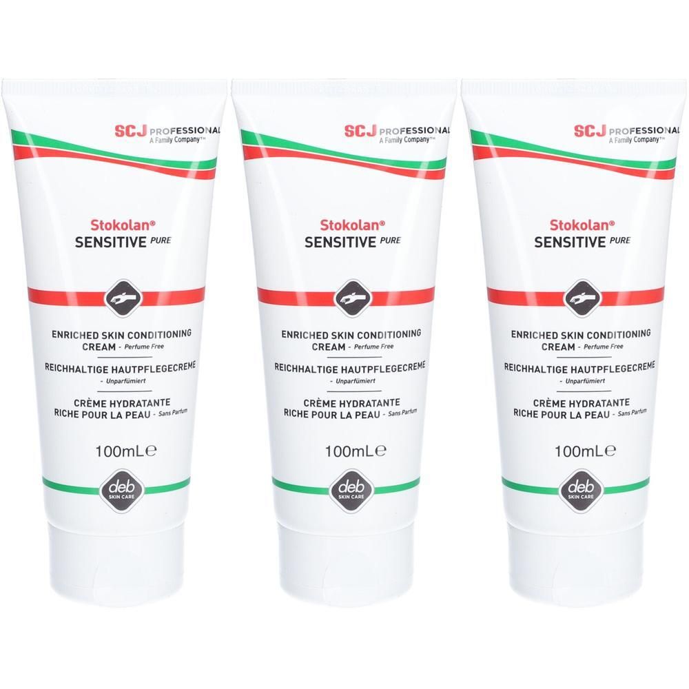 Trois tubes de crème Stokolan Sensitive Pure. Blanc, avec lignes rouge et verte. Texte : "ENRICHED SKIN CONDITIONING CREAM".