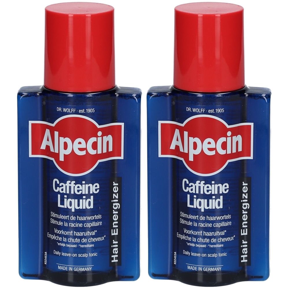 Deux flacons de Alpecin Caffeine Liquid. Flacons bleus avec bouchons rouges. Inscription: Alpecin, Caffeine Liquid, Hair Energizer.