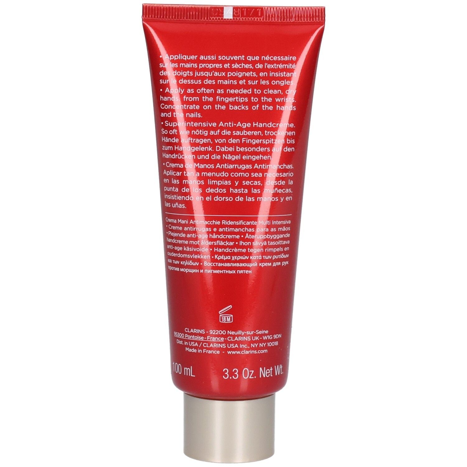 Arrière d'un tube rouge de crème pour les mains Clarins avec instructions d'application et informations produit.