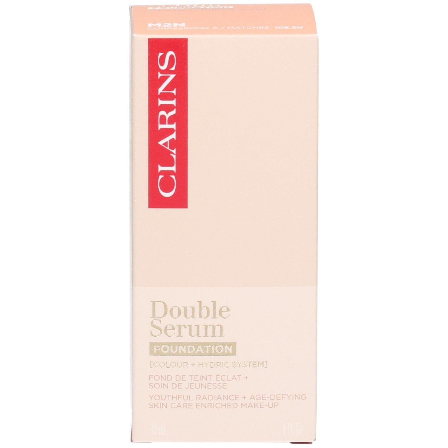 Clarins Double Serum Foundation M2N : flacon pompe doré avec fond de teint beige dans le compartiment inférieur.