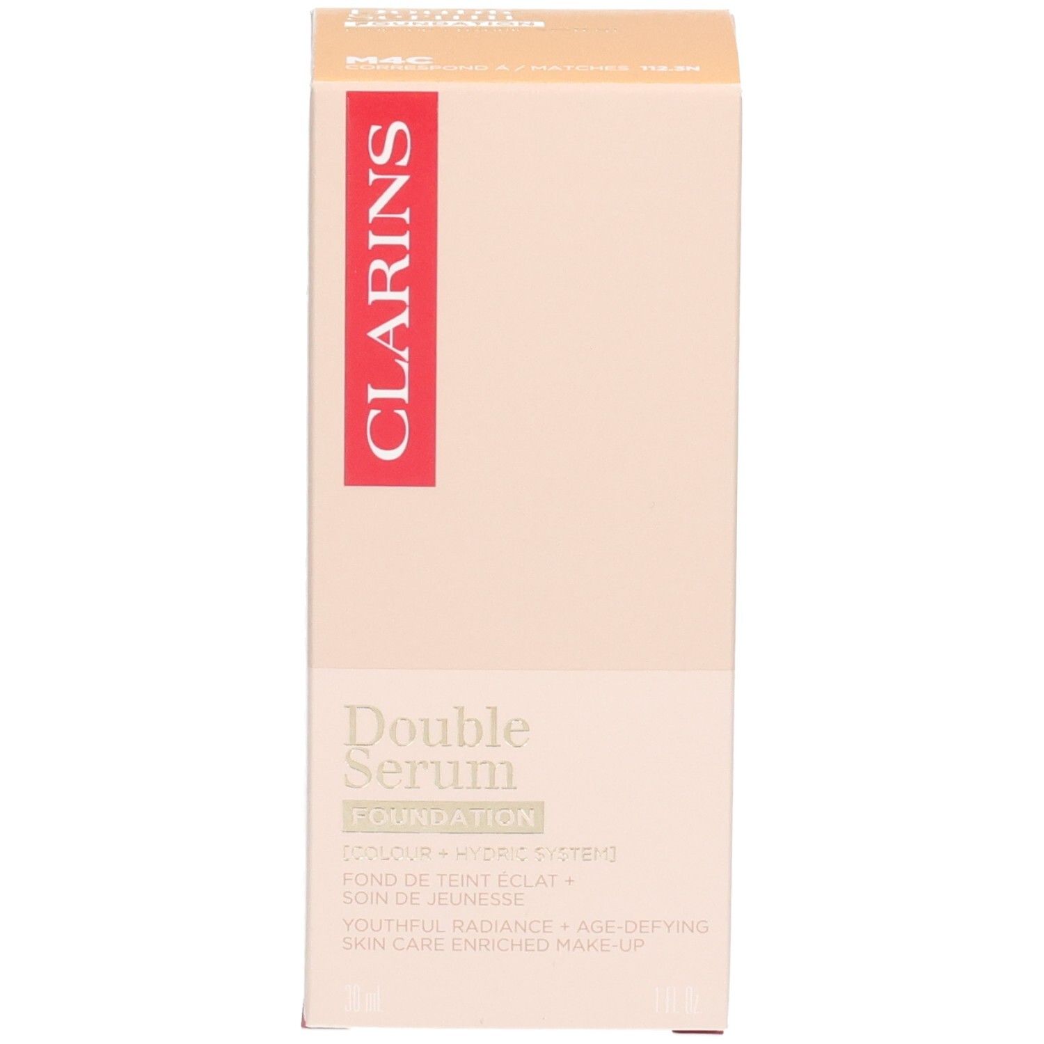 Clarins Double Serum Foundation M4C et son emballage. Flacon pompe doré à deux compartiments, l'un pour le fond de teint, l'autre pour le sérum.