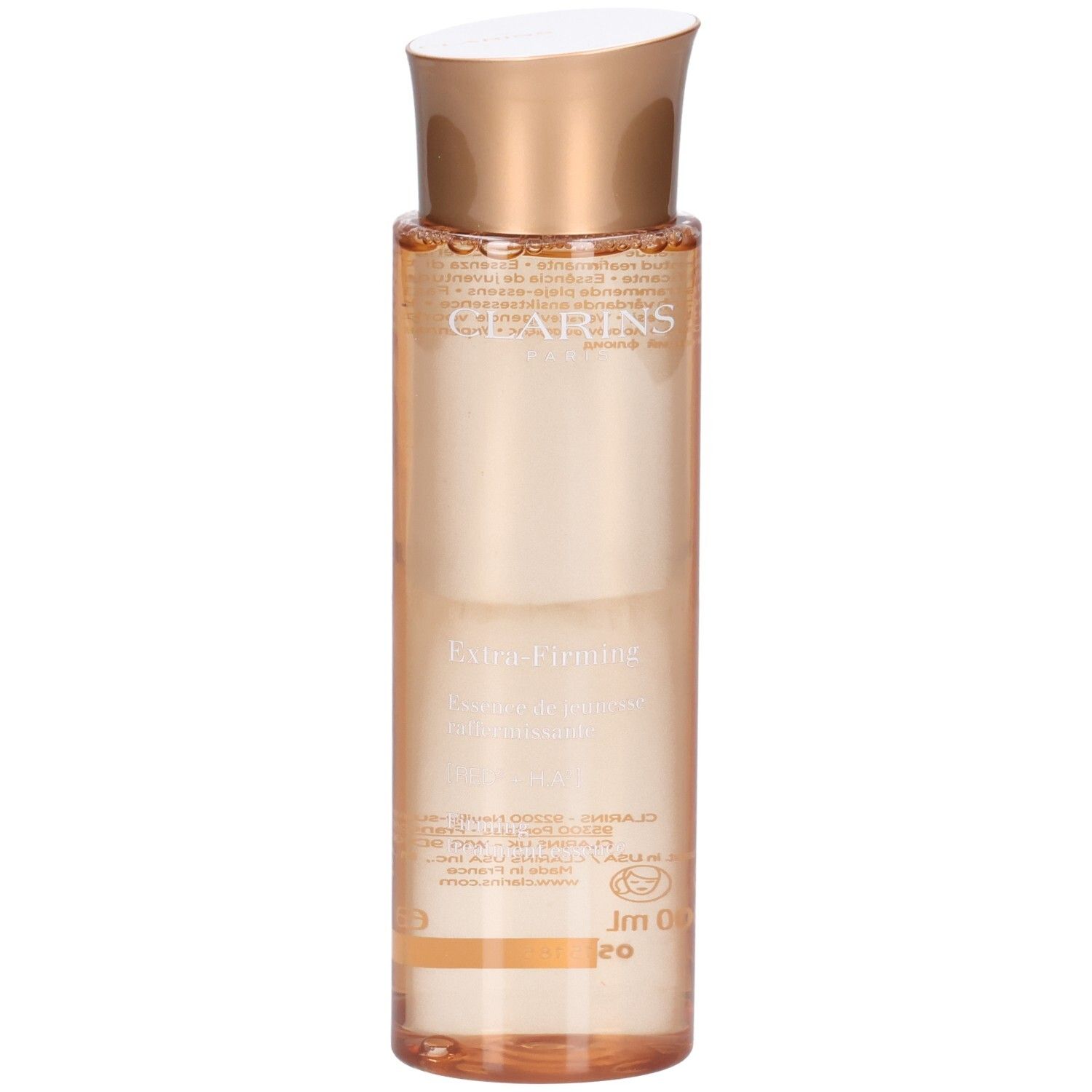 Essence Clarins Extra-Firming : flacon à bouchon doré et liquide pêche.