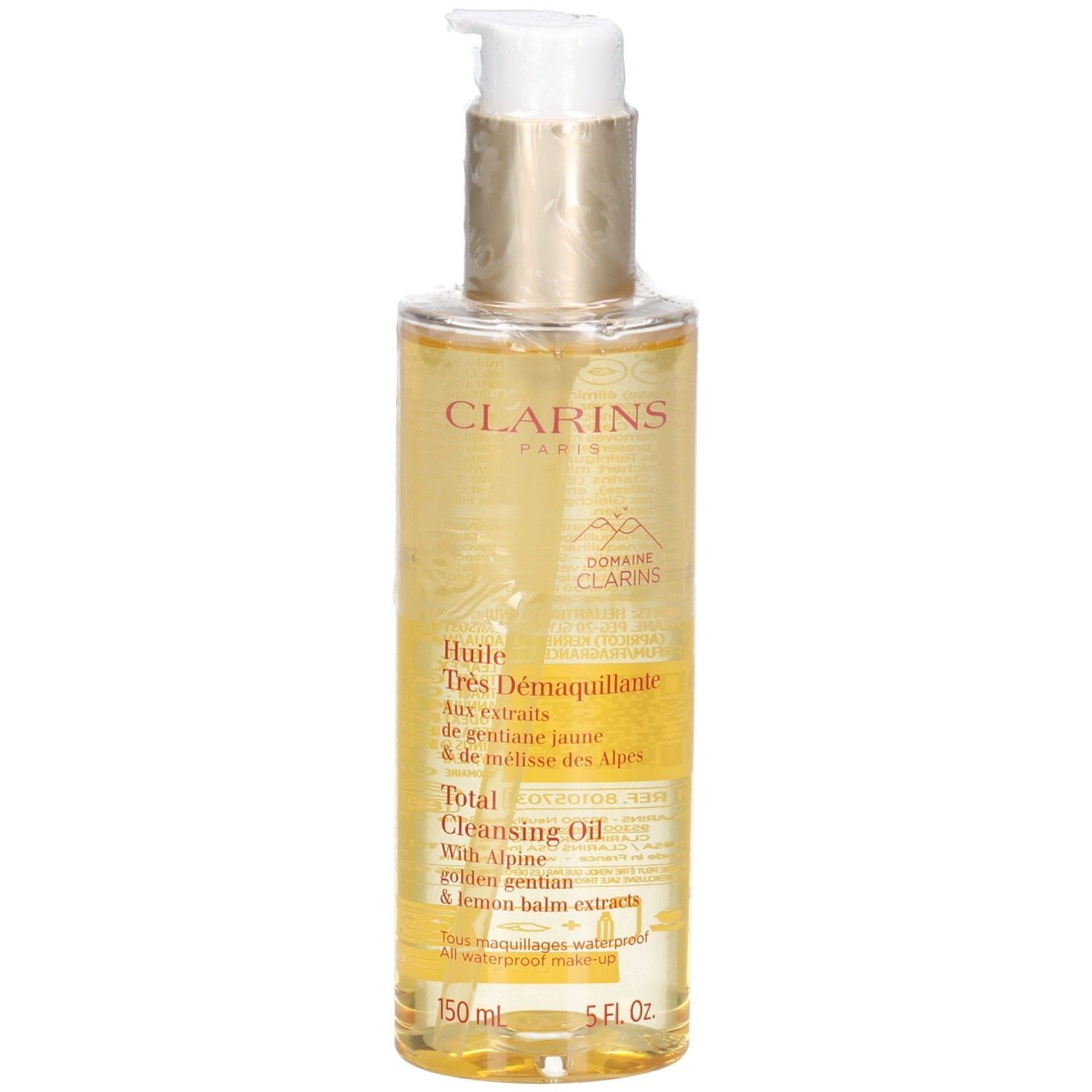 Huile démaquillante Clarins : liquide doré dans flacon pompe avec étiquette.