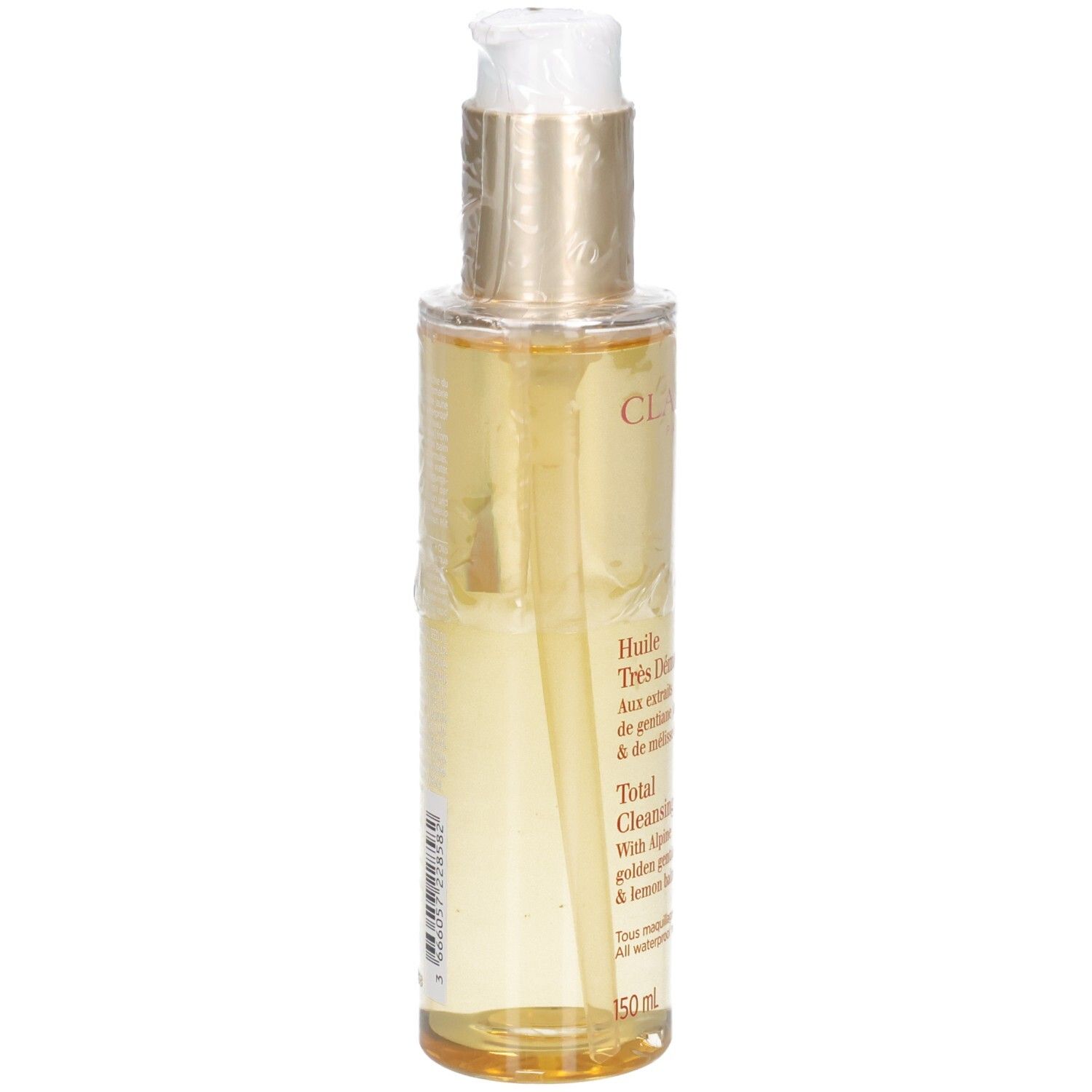 Huile démaquillante Clarins : liquide doré dans flacon pompe, vue latérale.