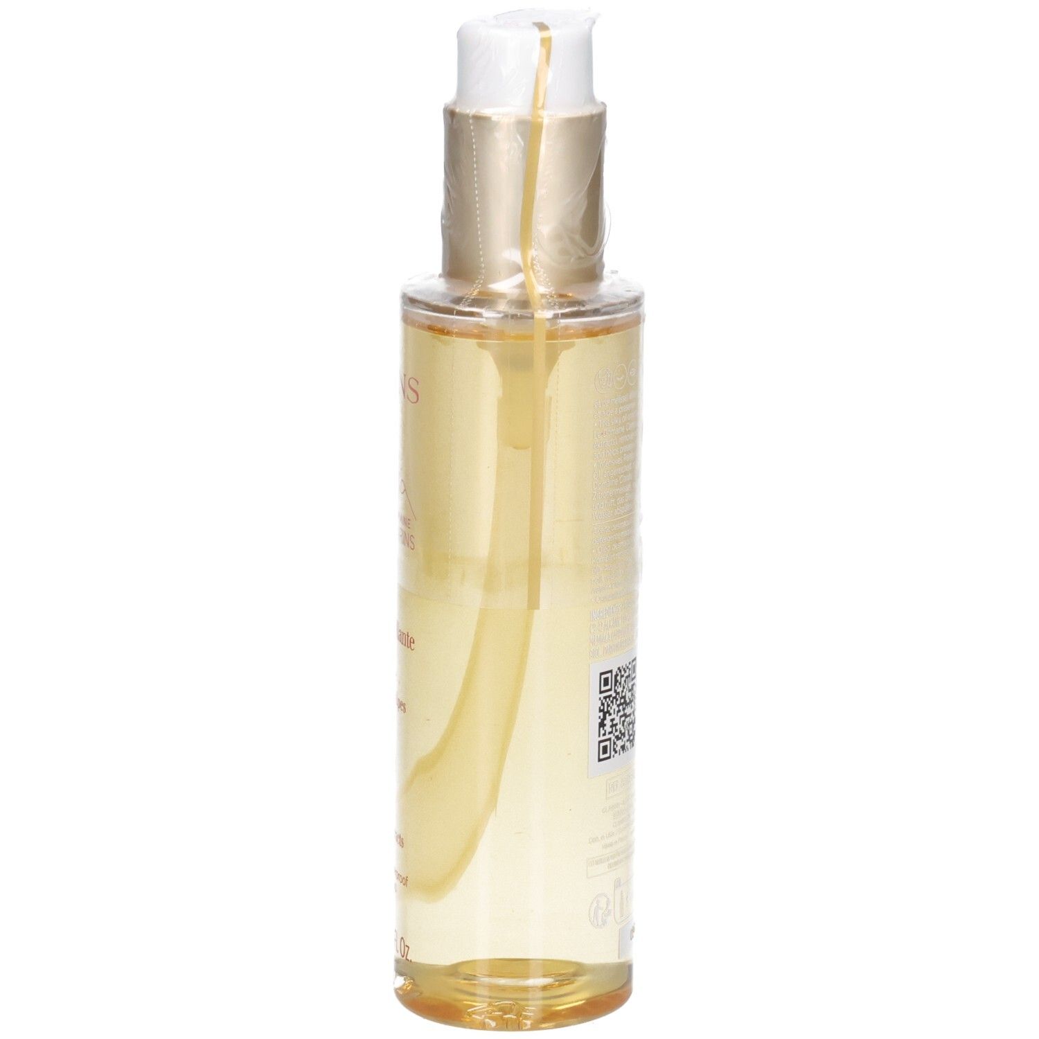 Huile démaquillante Clarins : liquide doré dans flacon pompe, vue latérale.